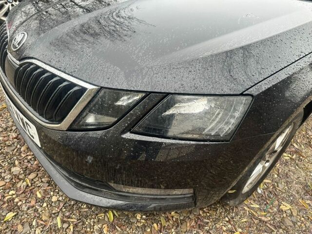 Черный Шкода Октавия, объемом двигателя 1 л и пробегом 176 тыс. км за 5690 $, фото 1 на Automoto.ua