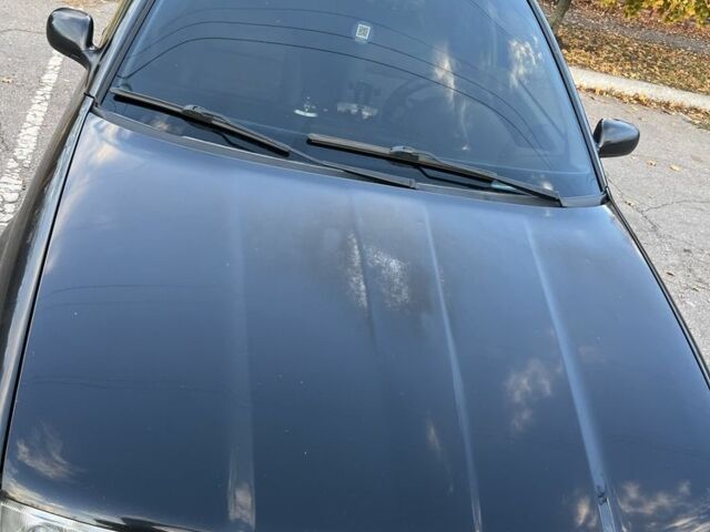 Черный Шкода Октавия, объемом двигателя 1.6 л и пробегом 302 тыс. км за 3900 $, фото 1 на Automoto.ua