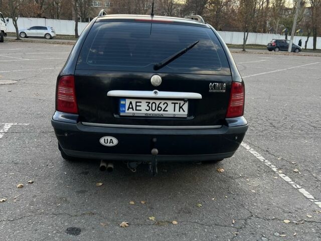 Черный Шкода Октавия, объемом двигателя 1.6 л и пробегом 302 тыс. км за 3900 $, фото 4 на Automoto.ua
