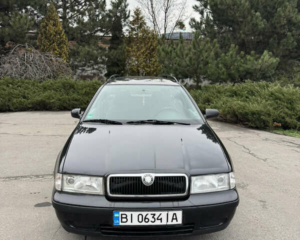 Черный Шкода Октавия, объемом двигателя 1.98 л и пробегом 188 тыс. км за 4200 $, фото 4 на Automoto.ua