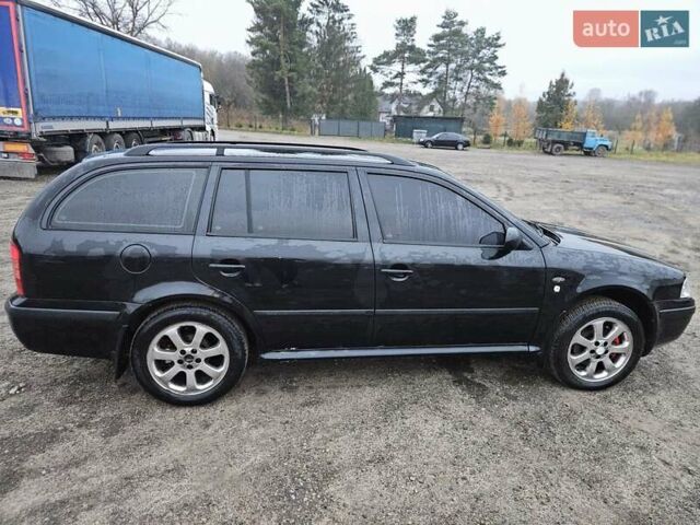 Черный Шкода Октавия, объемом двигателя 1.8 л и пробегом 390 тыс. км за 3999 $, фото 1 на Automoto.ua