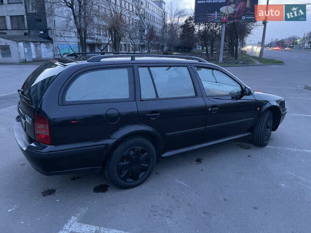 Черный Шкода Октавия, объемом двигателя 1.9 л и пробегом 423 тыс. км за 4200 $, фото 4 на Automoto.ua