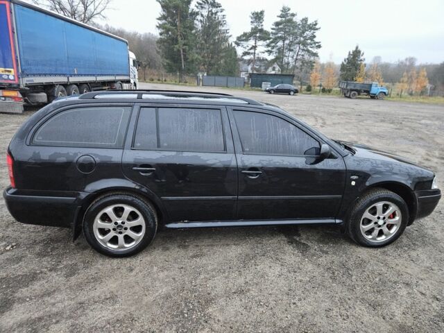 Черный Шкода Октавия, объемом двигателя 1.8 л и пробегом 390 тыс. км за 3999 $, фото 2 на Automoto.ua