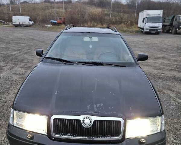 Черный Шкода Октавия, объемом двигателя 1.8 л и пробегом 390 тыс. км за 3999 $, фото 4 на Automoto.ua