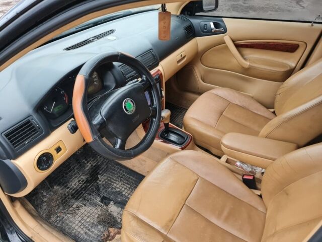 Черный Шкода Октавия, объемом двигателя 1.8 л и пробегом 370 тыс. км за 3500 $, фото 3 на Automoto.ua