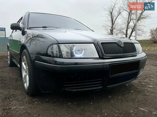 Черный Шкода Октавия, объемом двигателя 1.8 л и пробегом 310 тыс. км за 5999 $, фото 11 на Automoto.ua