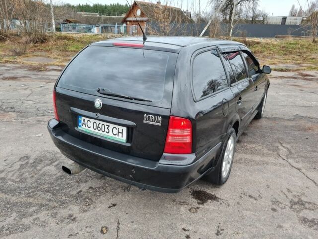 Черный Шкода Октавия, объемом двигателя 1.8 л и пробегом 370 тыс. км за 3500 $, фото 17 на Automoto.ua
