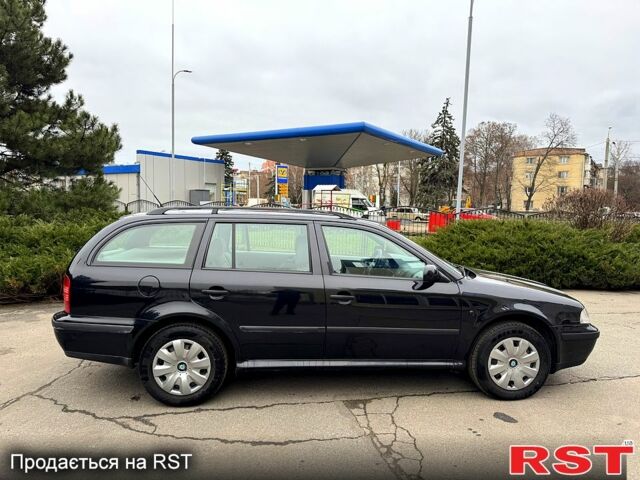 Черный Шкода Октавия, объемом двигателя 2 л и пробегом 188 тыс. км за 4200 $, фото 7 на Automoto.ua