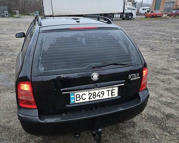 Черный Шкода Октавия, объемом двигателя 1.8 л и пробегом 390 тыс. км за 3999 $, фото 2 на Automoto.ua