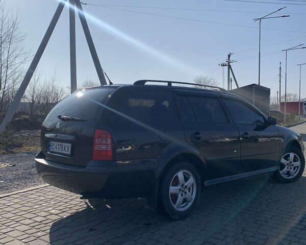 Черный Шкода Октавия, объемом двигателя 1.6 л и пробегом 240 тыс. км за 3850 $, фото 3 на Automoto.ua