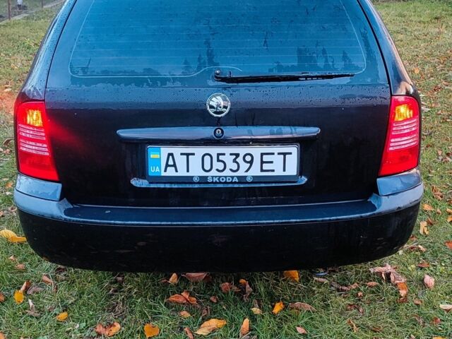 Черный Шкода Октавия, объемом двигателя 1.6 л и пробегом 313 тыс. км за 3850 $, фото 3 на Automoto.ua
