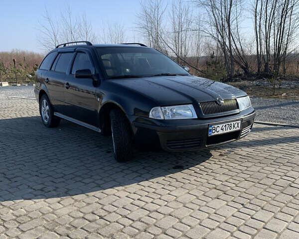 Черный Шкода Октавия, объемом двигателя 1.6 л и пробегом 240 тыс. км за 3850 $, фото 1 на Automoto.ua