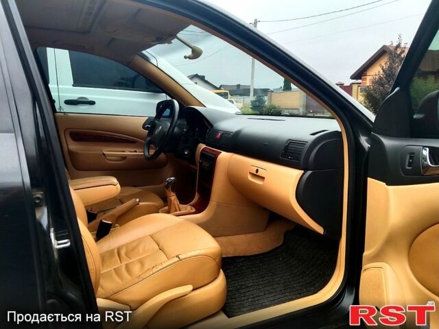 Черный Шкода Октавия, объемом двигателя 1.8 л и пробегом 322 тыс. км за 5000 $, фото 1 на Automoto.ua