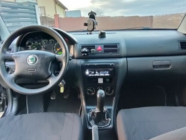 Черный Шкода Октавия, объемом двигателя 1.6 л и пробегом 313 тыс. км за 3850 $, фото 5 на Automoto.ua