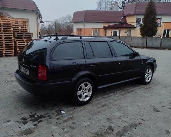 Черный Шкода Октавия, объемом двигателя 1.6 л и пробегом 315 тыс. км за 3599 $, фото 4 на Automoto.ua