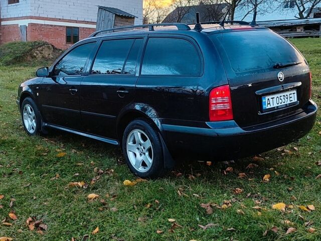 Черный Шкода Октавия, объемом двигателя 1.6 л и пробегом 313 тыс. км за 3850 $, фото 4 на Automoto.ua