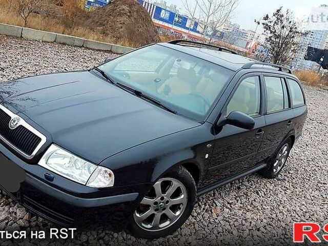 Черный Шкода Октавия, объемом двигателя 1.8 л и пробегом 270 тыс. км за 4500 $, фото 1 на Automoto.ua