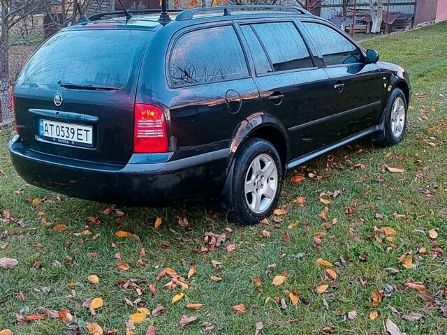 Черный Шкода Октавия, объемом двигателя 1.6 л и пробегом 313 тыс. км за 3850 $, фото 2 на Automoto.ua