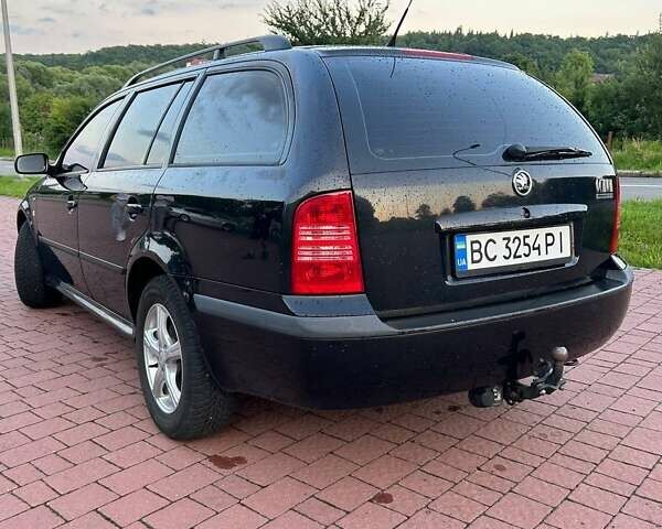 Черный Шкода Октавия, объемом двигателя 1.6 л и пробегом 298 тыс. км за 4300 $, фото 11 на Automoto.ua