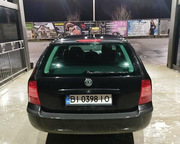 Чорний Шкода Октавія, об'ємом двигуна 1.6 л та пробігом 231 тис. км за 5000 $, фото 4 на Automoto.ua