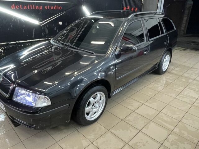 Черный Шкода Октавия, объемом двигателя 2 л и пробегом 275 тыс. км за 4800 $, фото 2 на Automoto.ua