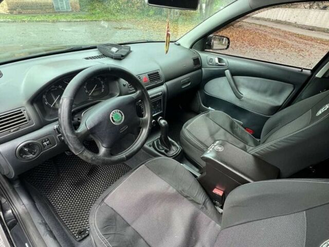 Чорний Шкода Октавія, об'ємом двигуна 1.6 л та пробігом 375 тис. км за 4600 $, фото 5 на Automoto.ua