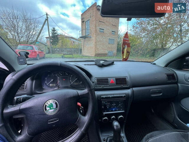 Черный Шкода Октавия, объемом двигателя 1.6 л и пробегом 375 тыс. км за 4600 $, фото 7 на Automoto.ua