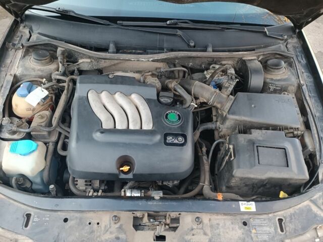 Чорний Шкода Октавія, об'ємом двигуна 2 л та пробігом 217 тис. км за 4500 $, фото 7 на Automoto.ua