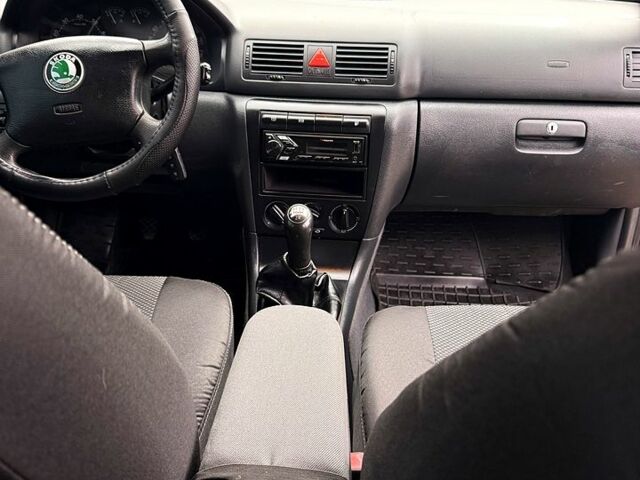 Чорний Шкода Октавія, об'ємом двигуна 1.6 л та пробігом 219 тис. км за 4650 $, фото 8 на Automoto.ua