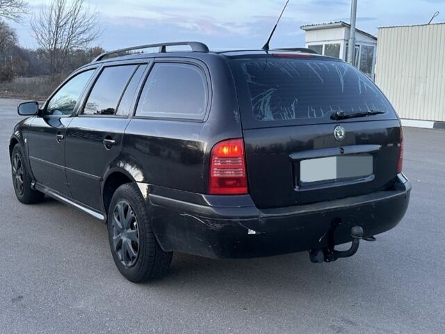 Черный Шкода Октавия, объемом двигателя 1.9 л и пробегом 276 тыс. км за 2245 $, фото 2 на Automoto.ua