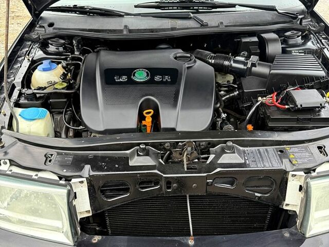 Чорний Шкода Октавія, об'ємом двигуна 1.6 л та пробігом 219 тис. км за 4650 $, фото 5 на Automoto.ua