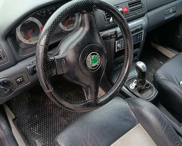 Черный Шкода Октавия, объемом двигателя 1.78 л и пробегом 265 тыс. км за 4500 $, фото 3 на Automoto.ua