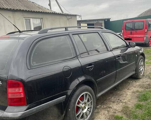 Черный Шкода Октавия, объемом двигателя 1.6 л и пробегом 227 тыс. км за 4200 $, фото 2 на Automoto.ua