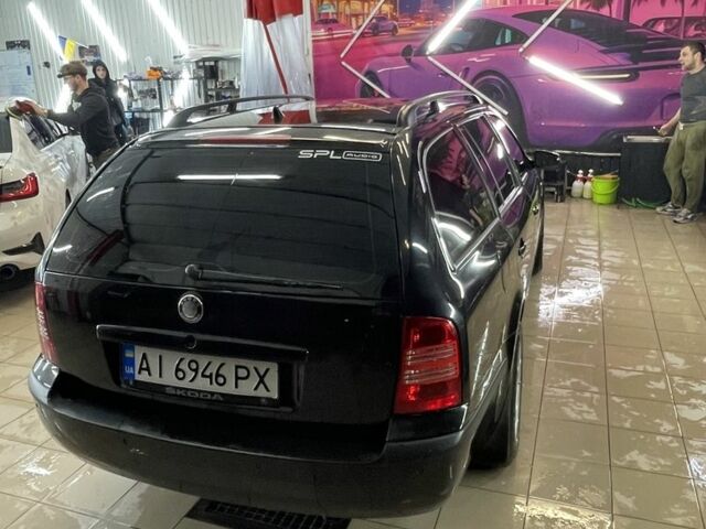 Черный Шкода Октавия, объемом двигателя 2 л и пробегом 275 тыс. км за 4800 $, фото 4 на Automoto.ua