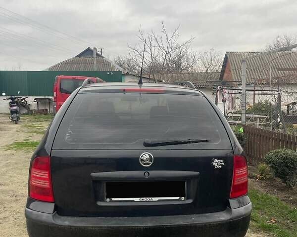 Черный Шкода Октавия, объемом двигателя 1.6 л и пробегом 227 тыс. км за 4200 $, фото 3 на Automoto.ua