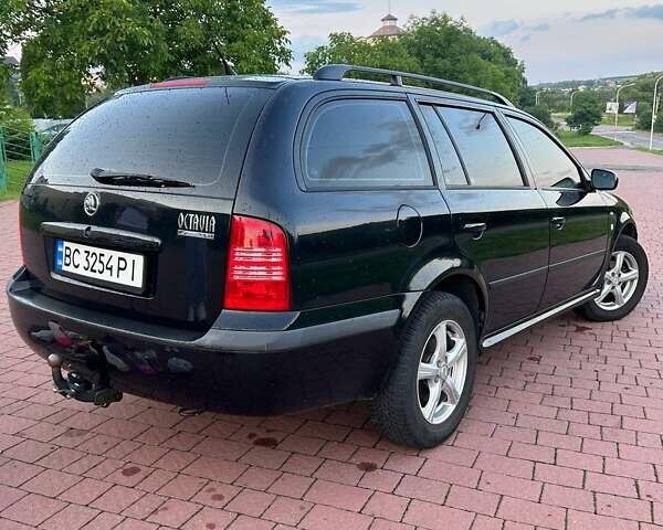 Черный Шкода Октавия, объемом двигателя 1.6 л и пробегом 298 тыс. км за 4300 $, фото 2 на Automoto.ua