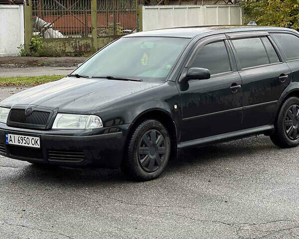Черный Шкода Октавия, объемом двигателя 1.6 л и пробегом 375 тыс. км за 4600 $, фото 2 на Automoto.ua