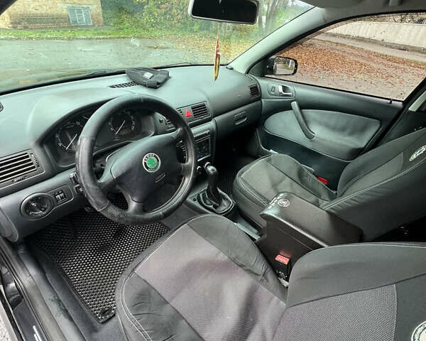 Черный Шкода Октавия, объемом двигателя 1.6 л и пробегом 375 тыс. км за 4600 $, фото 8 на Automoto.ua