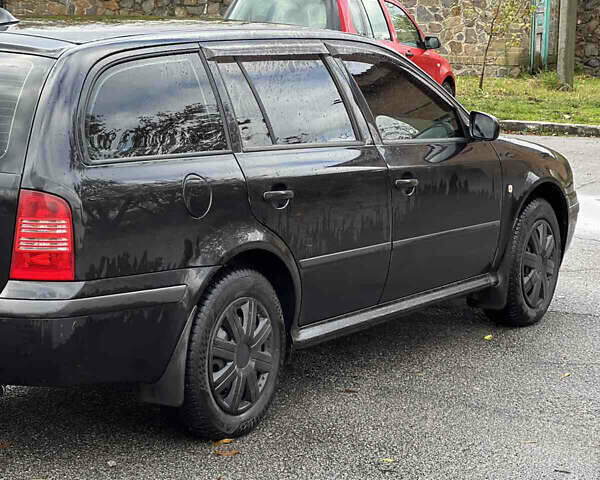 Черный Шкода Октавия, объемом двигателя 1.6 л и пробегом 375 тыс. км за 4600 $, фото 5 на Automoto.ua