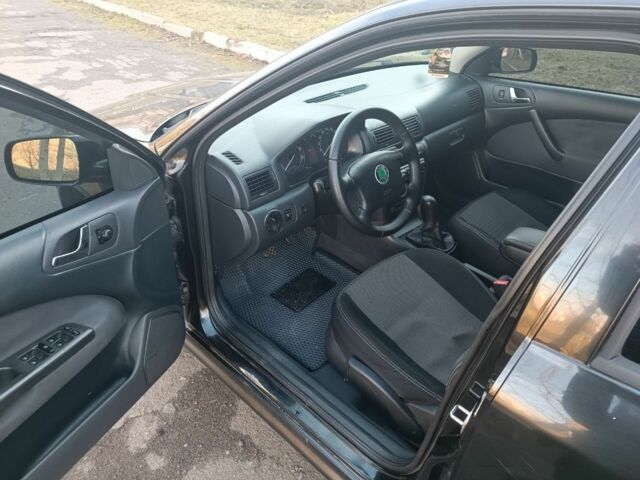 Чорний Шкода Октавія, об'ємом двигуна 2 л та пробігом 217 тис. км за 4500 $, фото 6 на Automoto.ua