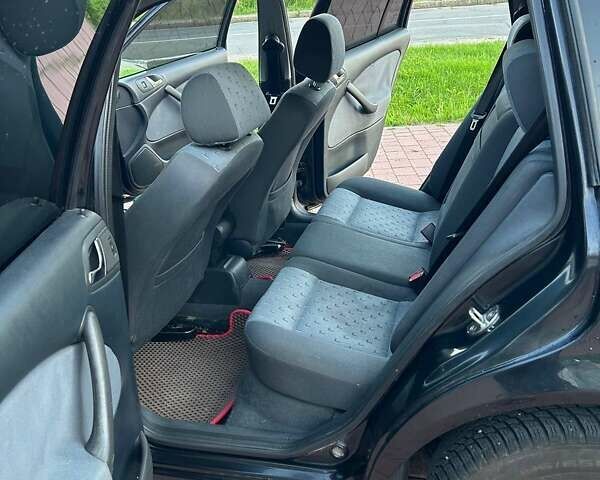 Черный Шкода Октавия, объемом двигателя 1.6 л и пробегом 298 тыс. км за 4300 $, фото 5 на Automoto.ua