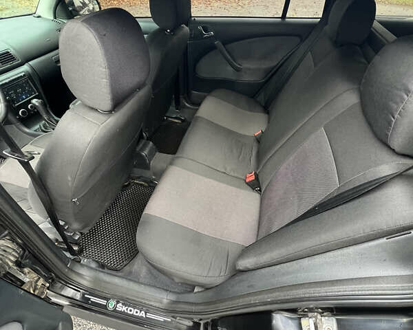 Черный Шкода Октавия, объемом двигателя 1.6 л и пробегом 375 тыс. км за 4600 $, фото 9 на Automoto.ua