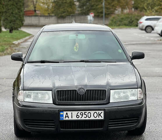 Черный Шкода Октавия, объемом двигателя 1.6 л и пробегом 375 тыс. км за 4600 $, фото 1 на Automoto.ua