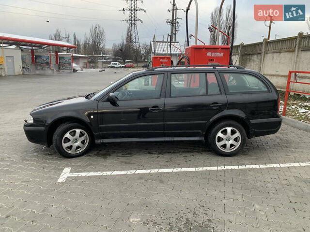 Черный Шкода Октавия, объемом двигателя 1.9 л и пробегом 299 тыс. км за 5000 $, фото 3 на Automoto.ua