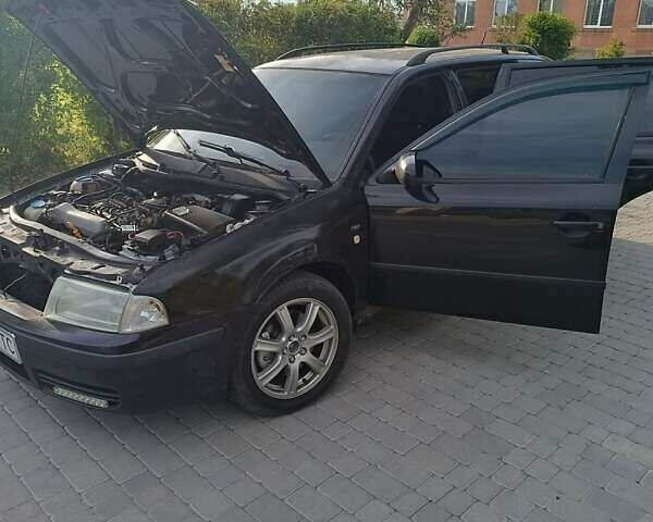 Черный Шкода Октавия, объемом двигателя 1.8 л и пробегом 300 тыс. км за 3700 $, фото 5 на Automoto.ua