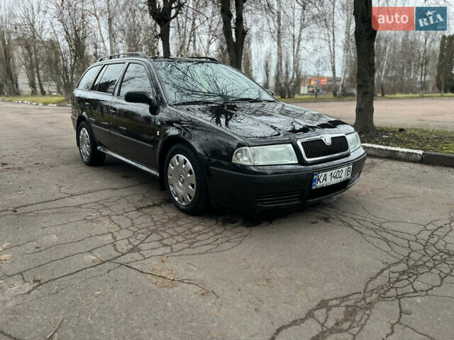Черный Шкода Октавия, объемом двигателя 1.6 л и пробегом 263 тыс. км за 4500 $, фото 6 на Automoto.ua