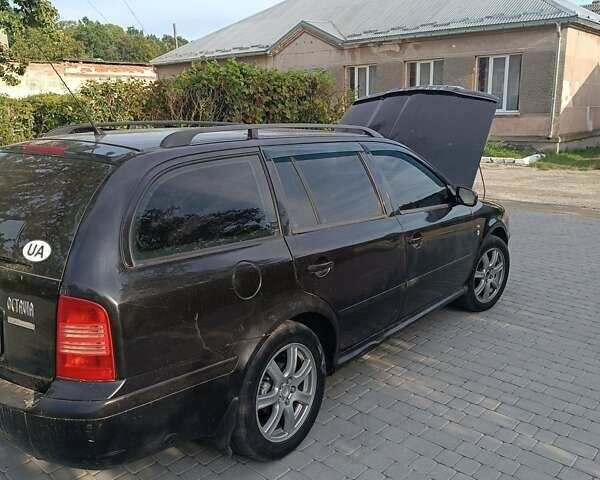Черный Шкода Октавия, объемом двигателя 1.8 л и пробегом 300 тыс. км за 3700 $, фото 7 на Automoto.ua