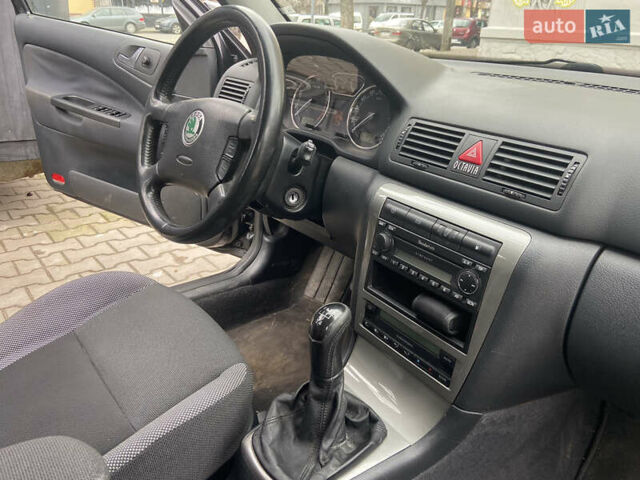 Черный Шкода Октавия, объемом двигателя 1.6 л и пробегом 210 тыс. км за 5600 $, фото 6 на Automoto.ua