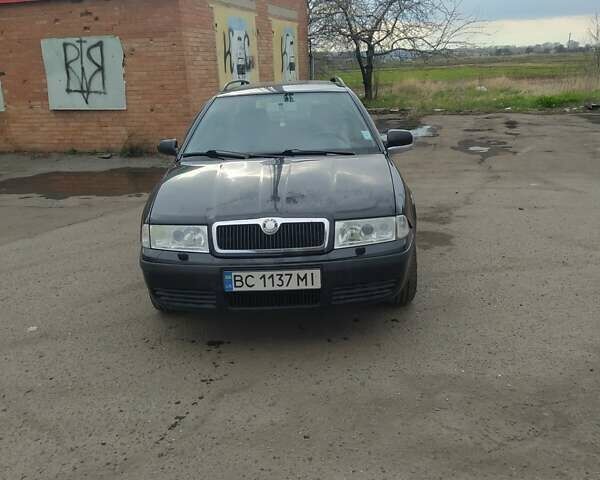 Черный Шкода Октавия, объемом двигателя 1.6 л и пробегом 270 тыс. км за 4500 $, фото 11 на Automoto.ua