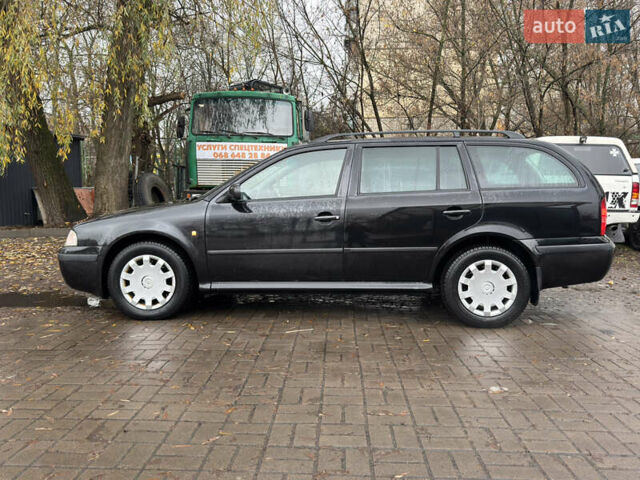 Черный Шкода Октавия, объемом двигателя 1.6 л и пробегом 215 тыс. км за 4800 $, фото 1 на Automoto.ua